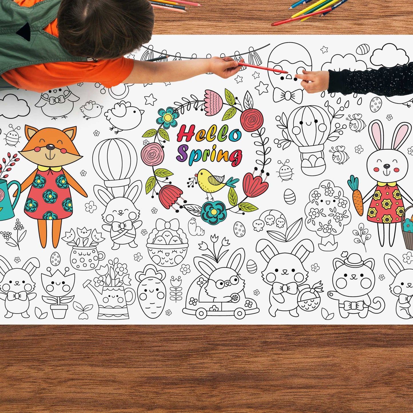 Kids coloring the Hello Spring poster on the floor