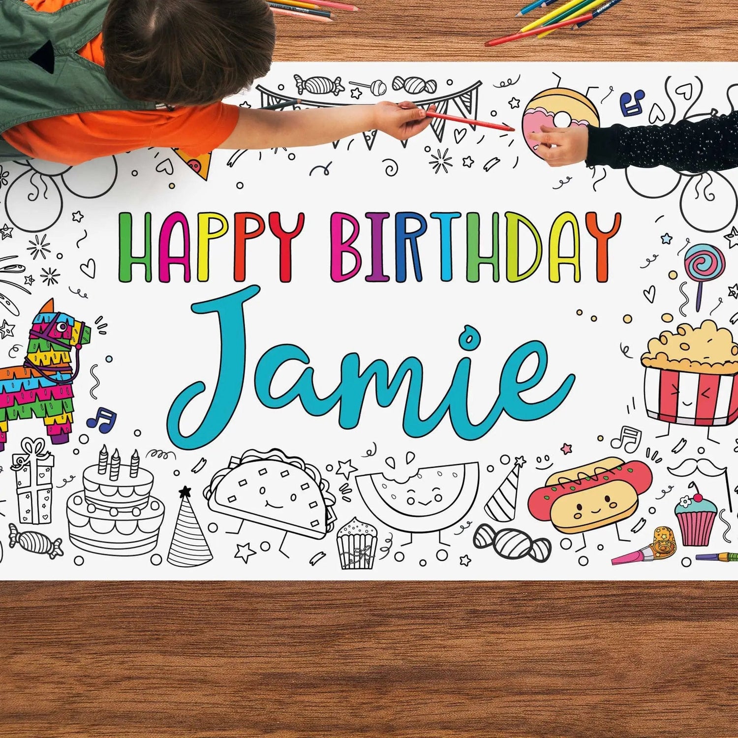 kids coloring a poster on the floor